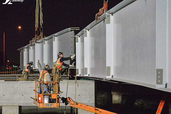 Crew working on the new Elmhurst Road Bridge under the Elmhurst Road Project at the I-90.