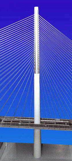 The chosen design was for a cable-stayed bridge with a twin aerodynamic deck suspended from two 290m-high single pole towers.